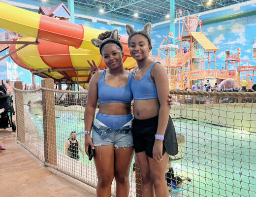 Two teen girls enjoying the indoor water park at Great Wolf Lodge Illinois