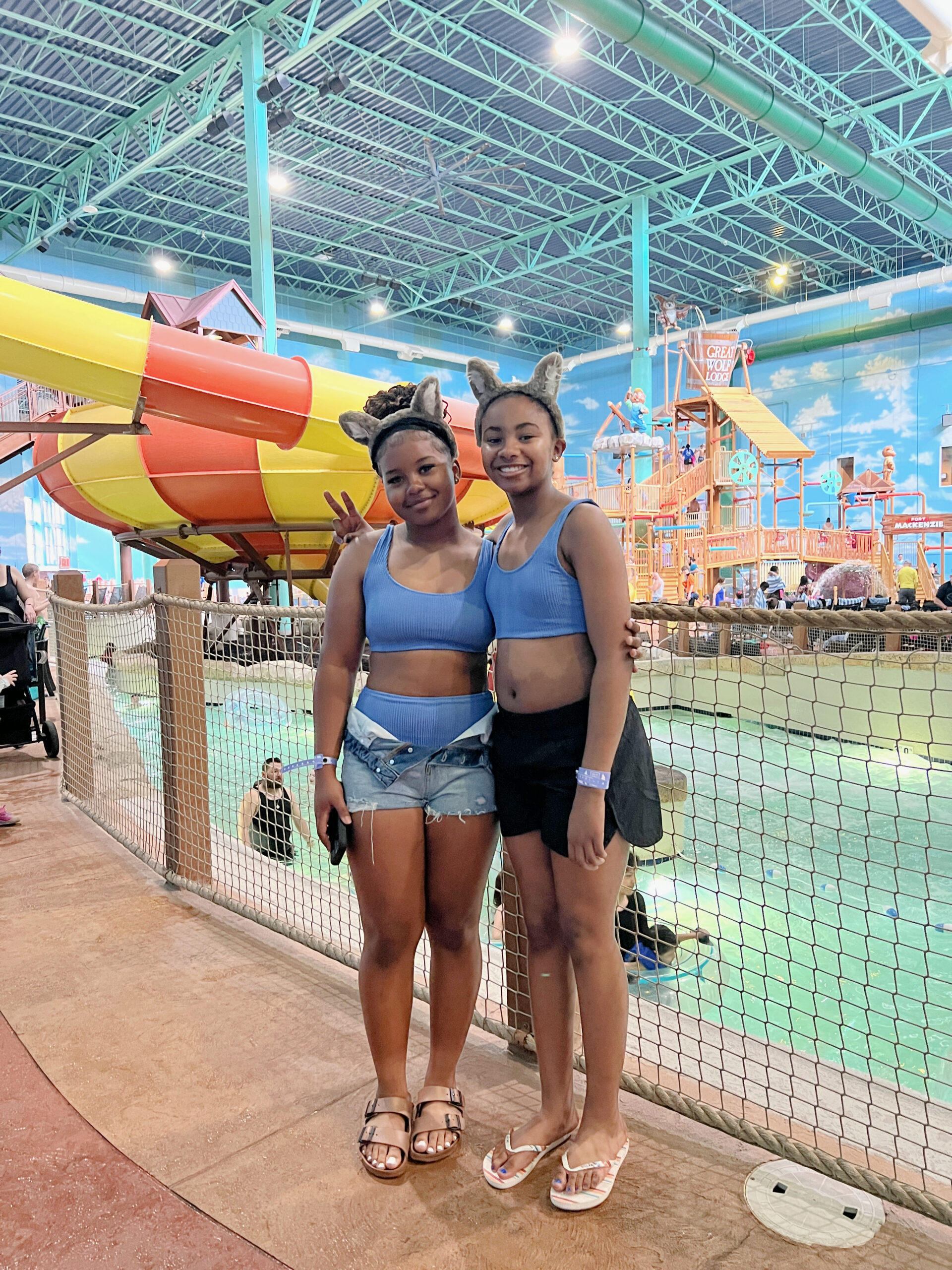 Two teen girls enjoying the indoor water park at Great Wolf Lodge Illinois